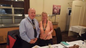 ron-receiving-badge-of-office-from-debbie